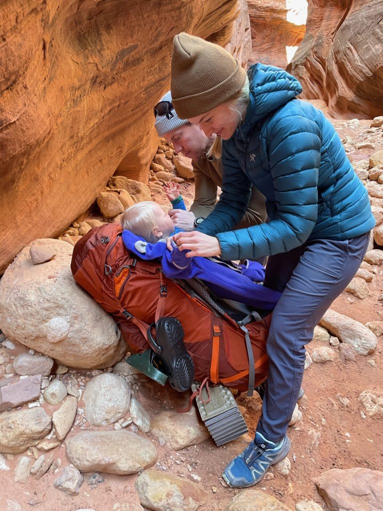 Getting baby dressed in layers when backpacking