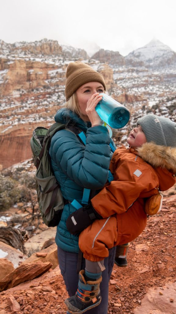Drinking water while hiking with toddler